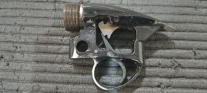 A fairly typical scuffed and damaged trigger block